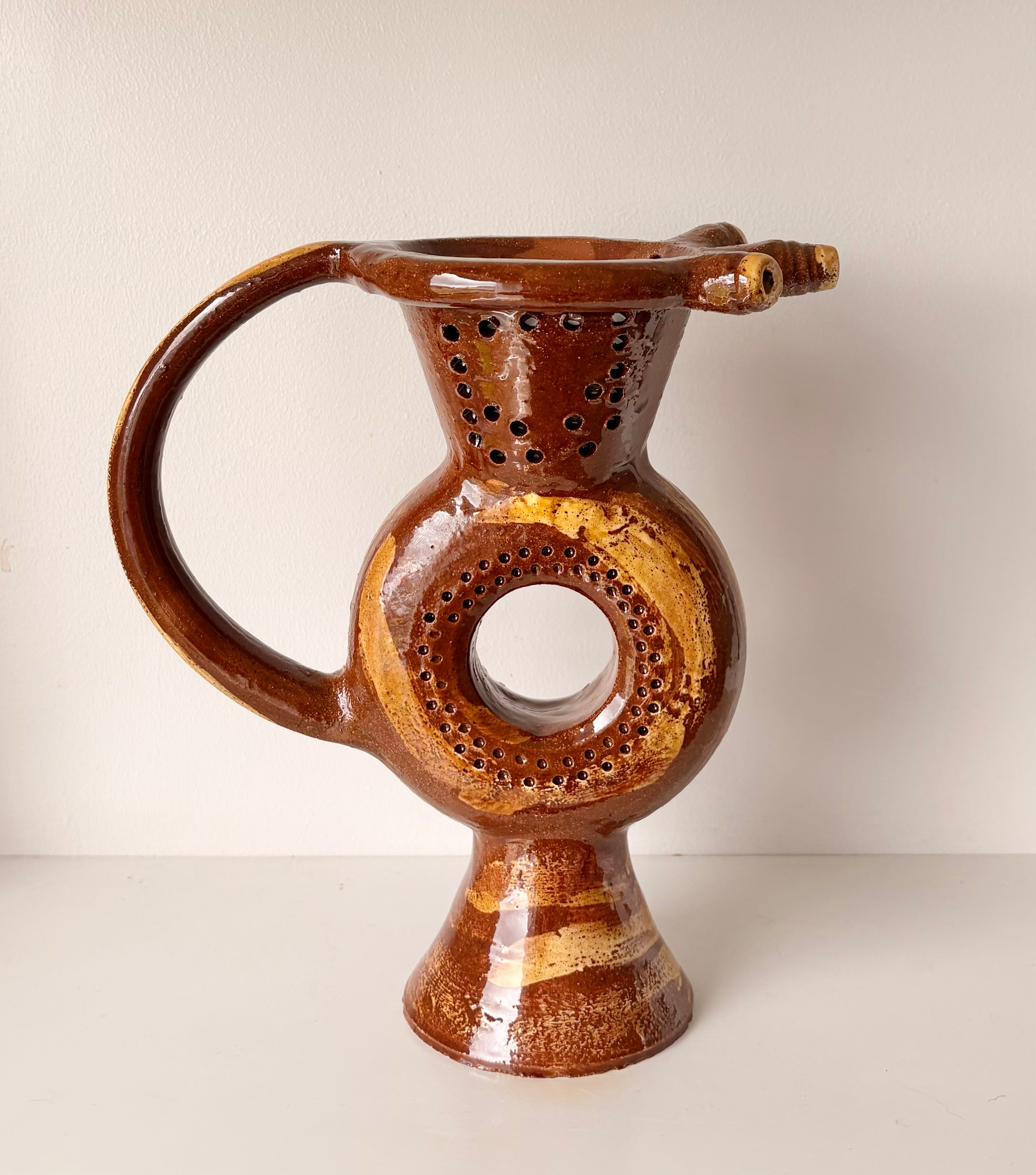 Earthenware Puzzle Jug with a Classic Lustrous Brown glaze